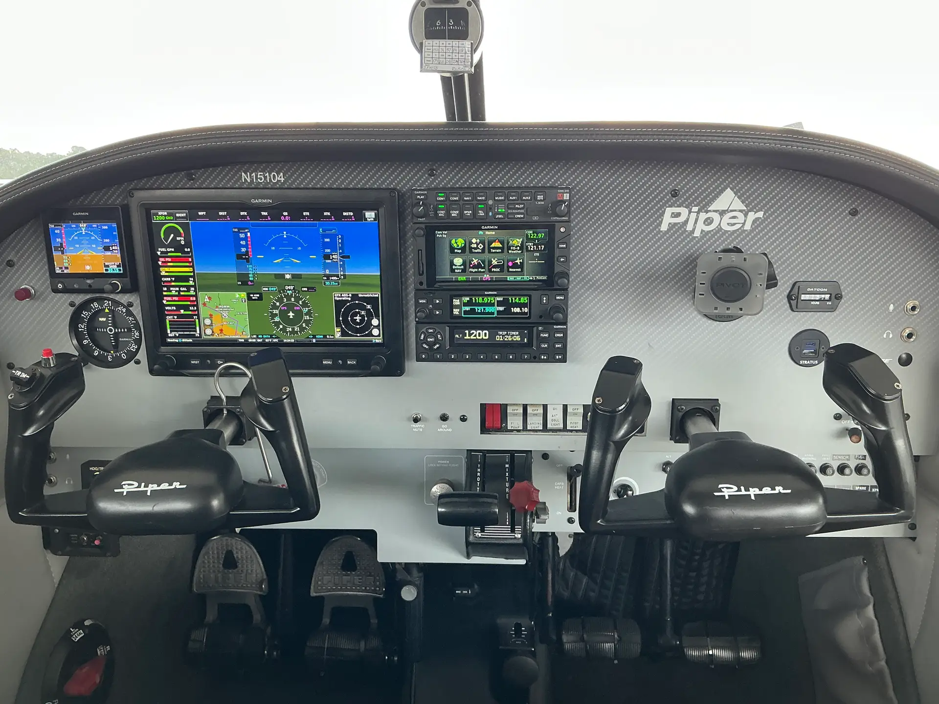 Garmin glass cockpit avionics dash inside N15104 Piper Cherokee