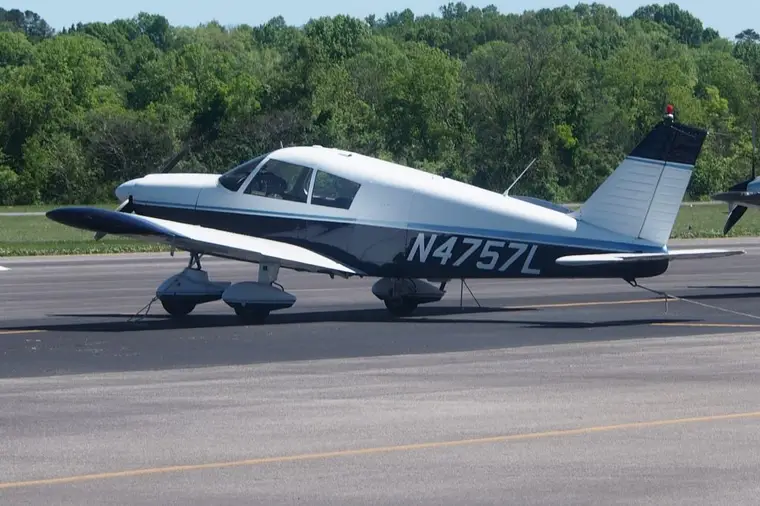 Piper Cherokee single-engine IFR training aircraft showing tail number N4757L