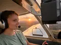 Savanna H. pilot student inside cockpit with horizon in the background at M2A Aviation Academy