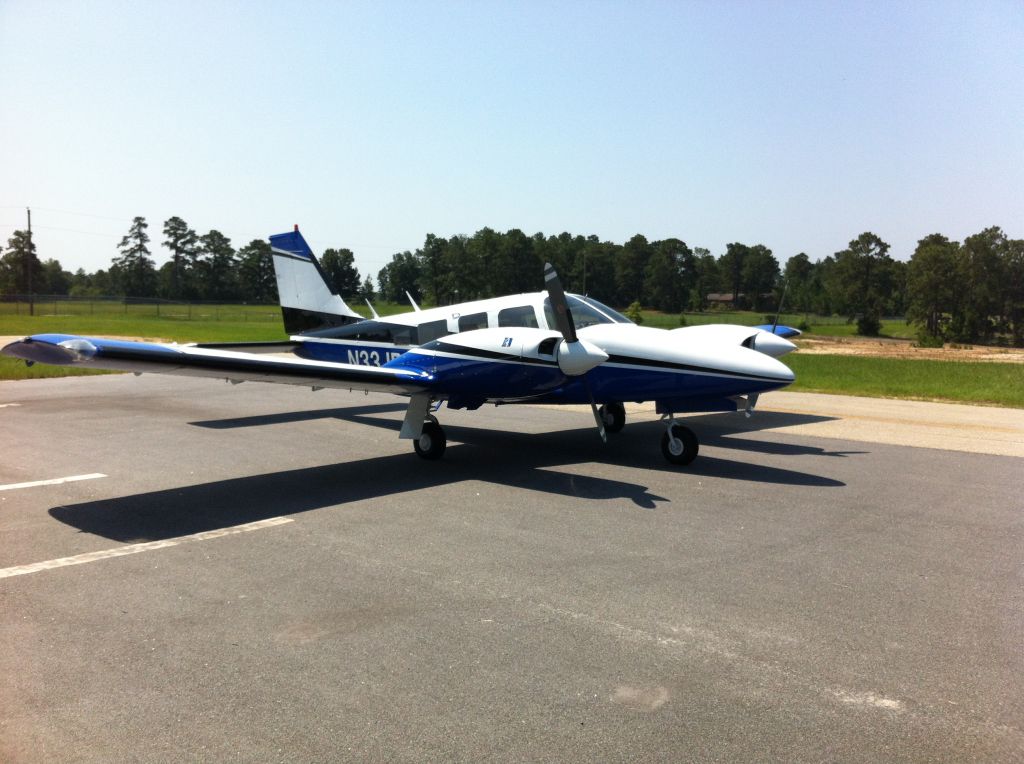 Piper Seneca II twin-engine aircraft parked on the ramp at Wayne Executive Jetport in Pikeville, North Carolina