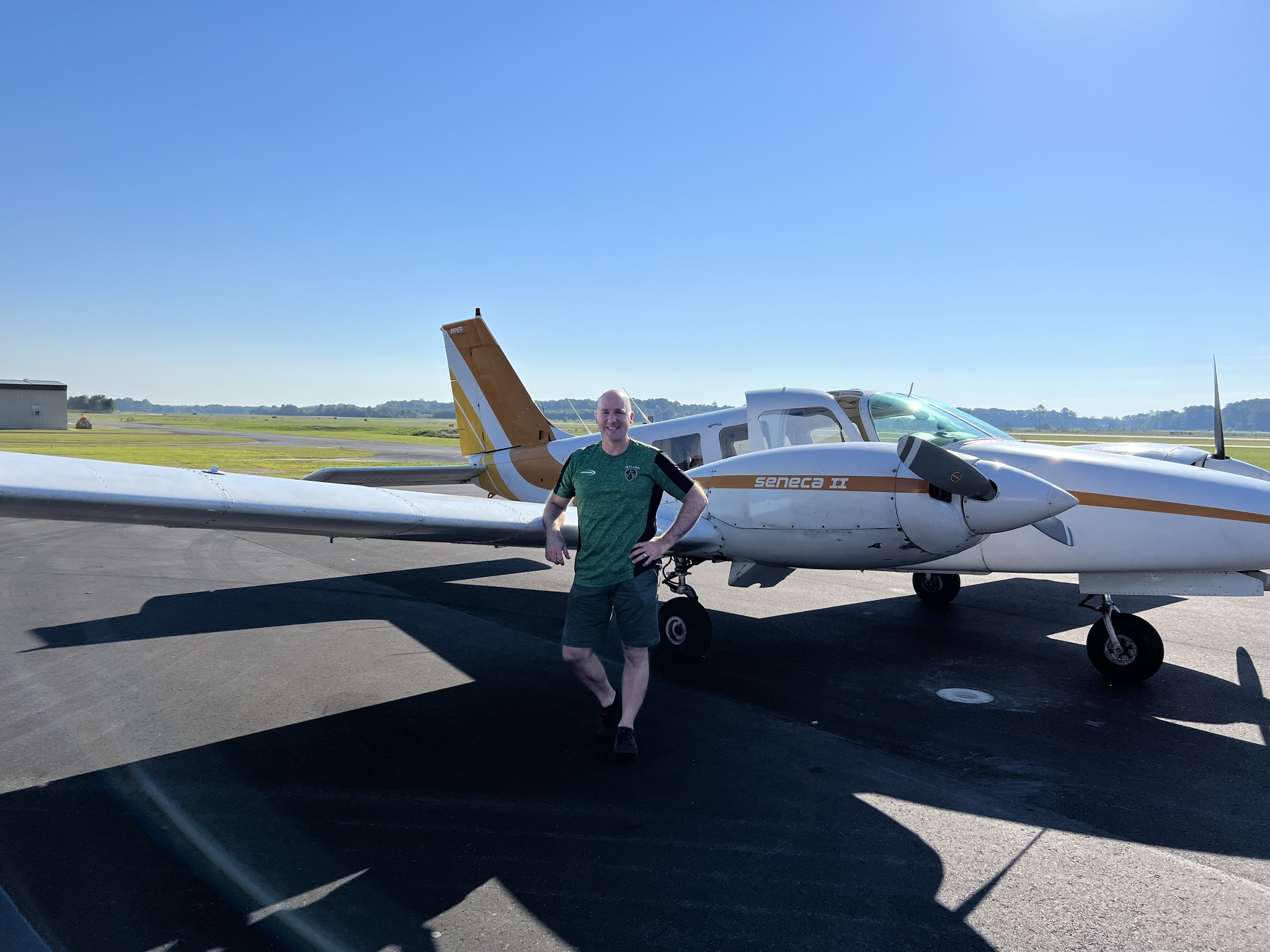 Student pilot posing in front of training aircraft at M2A Aviation Academy in Pikeville, NC
